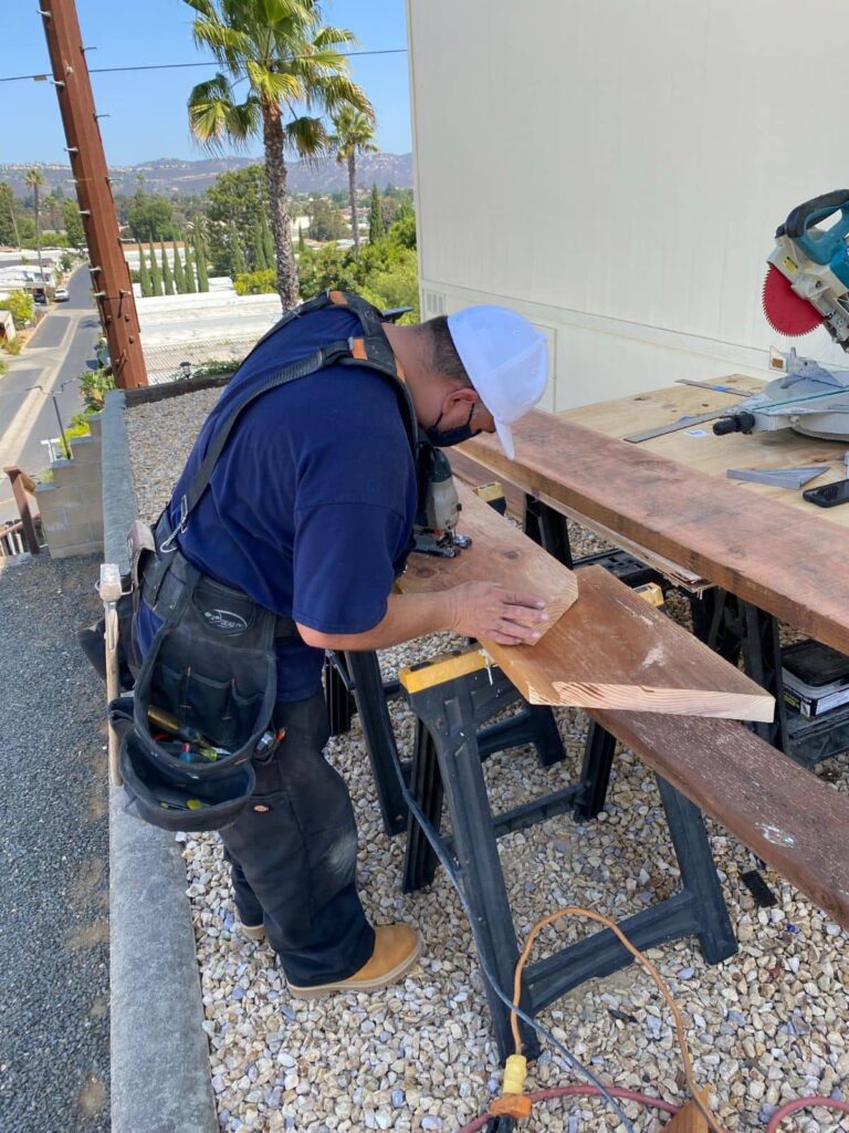 Our handyman service cutting wood outside for a home repairs project in San Marcos, CA.
