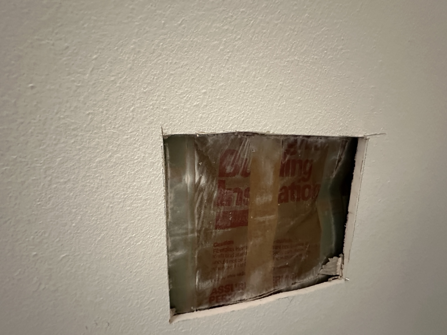 Ceiling drywall access opening during fan installation