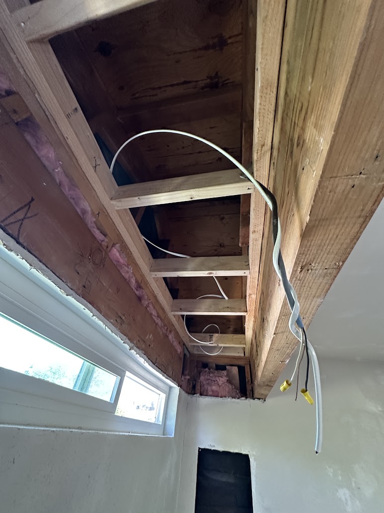 Vista bathroom ceiling framing exposed during soffit removal