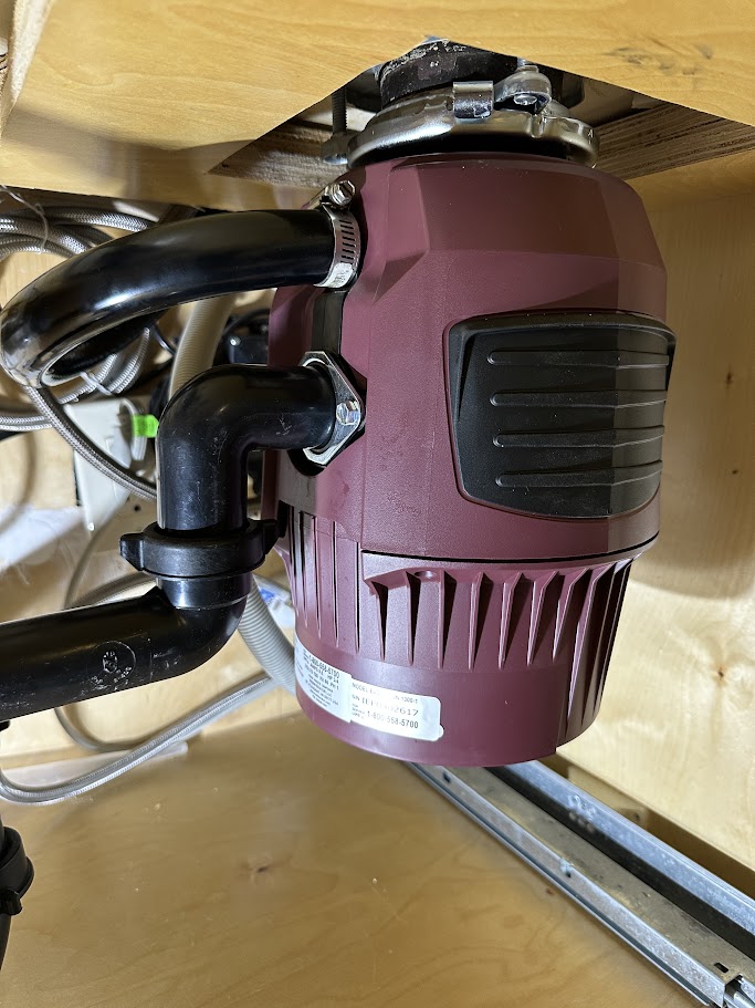Three-quarter-horsepower garbage disposal installed beneath a kitchen sink in Fallbrook